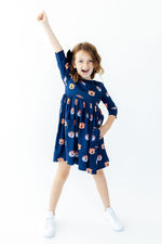 Girls' 3/4 sleeve twirl dress in Auburn blue and orange print with full spinning skirt and pockets