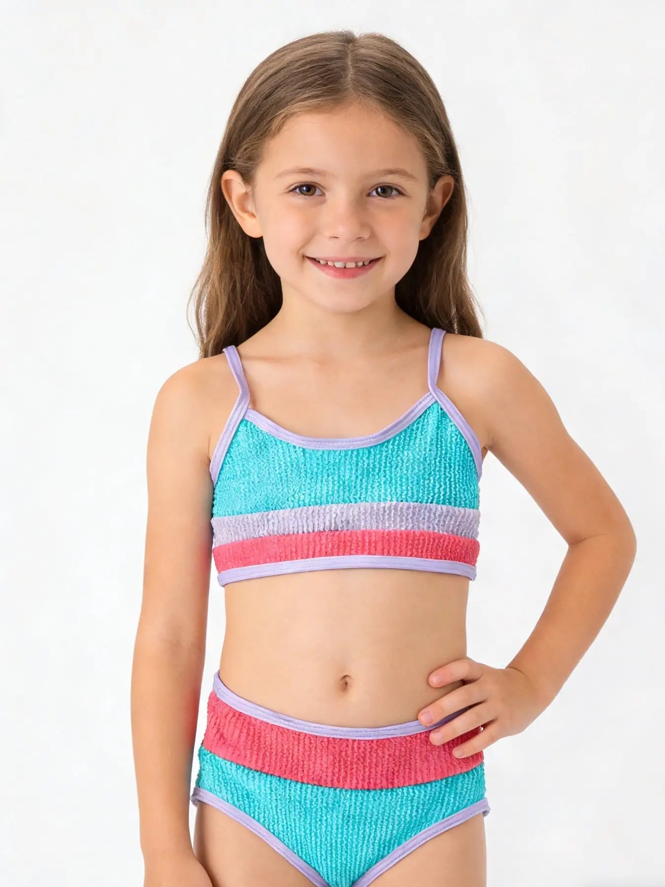 Kid's swimsuit in vibrant blue and red stripes.