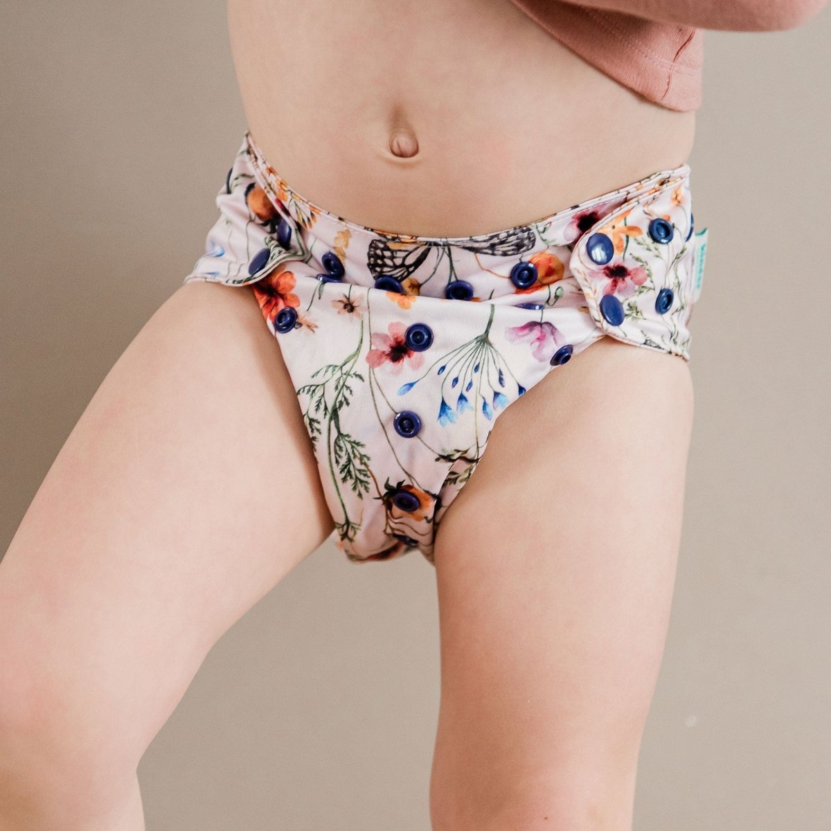 Floral: Essentials Pocket Cloth Diaper with Athletic Wicking Jersey, Grows with your Baby by Kinder Cloth Diaper Co.