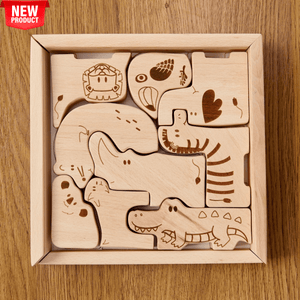 Wooden safari animal puzzle box holding nine handcrafted pieces including a lion, elephant, zebra, rhino and koala.