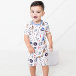 Two-piece short-sleeve and shorts pajama set with a playful boogie print