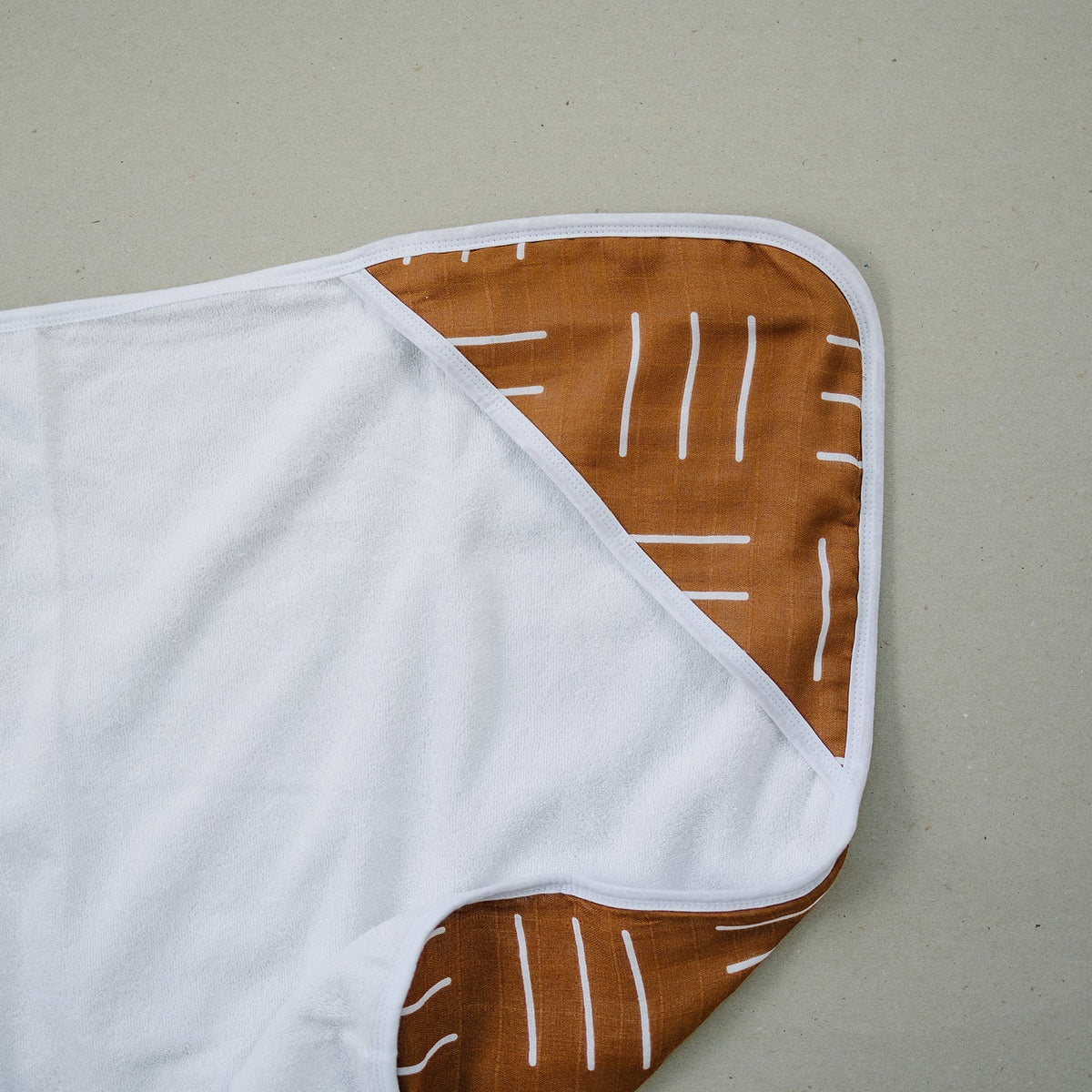 Mustard Mudcloth Muslin Hooded Towel - Textile, Orange, Stitch, Pattern | Everetts Place