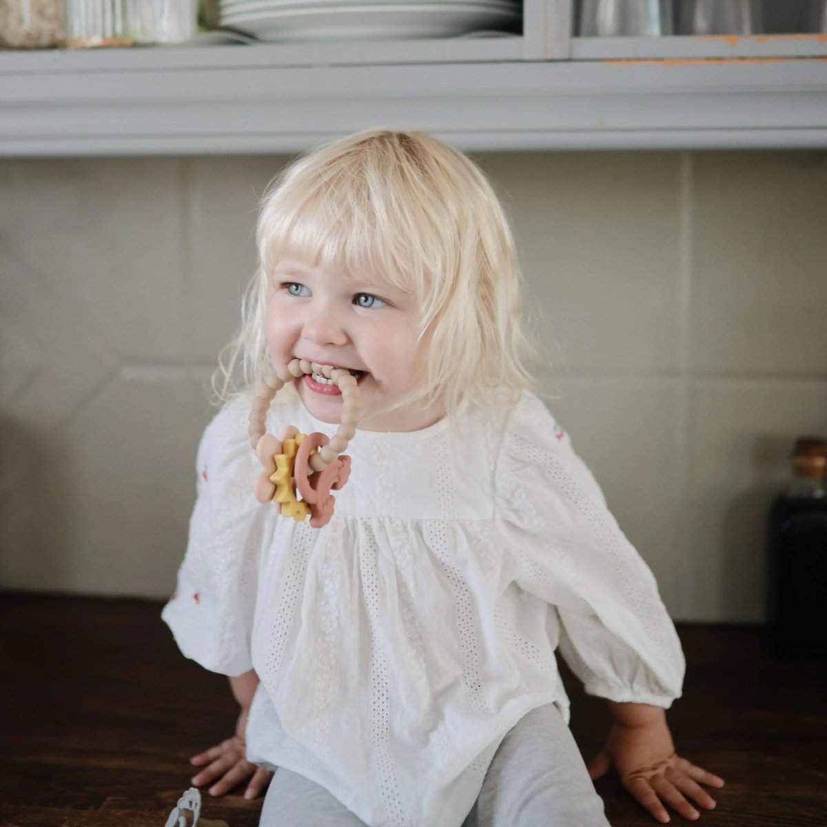 Mushie Nature Teething Ring with Sensory Charms and Soothing Textures - 