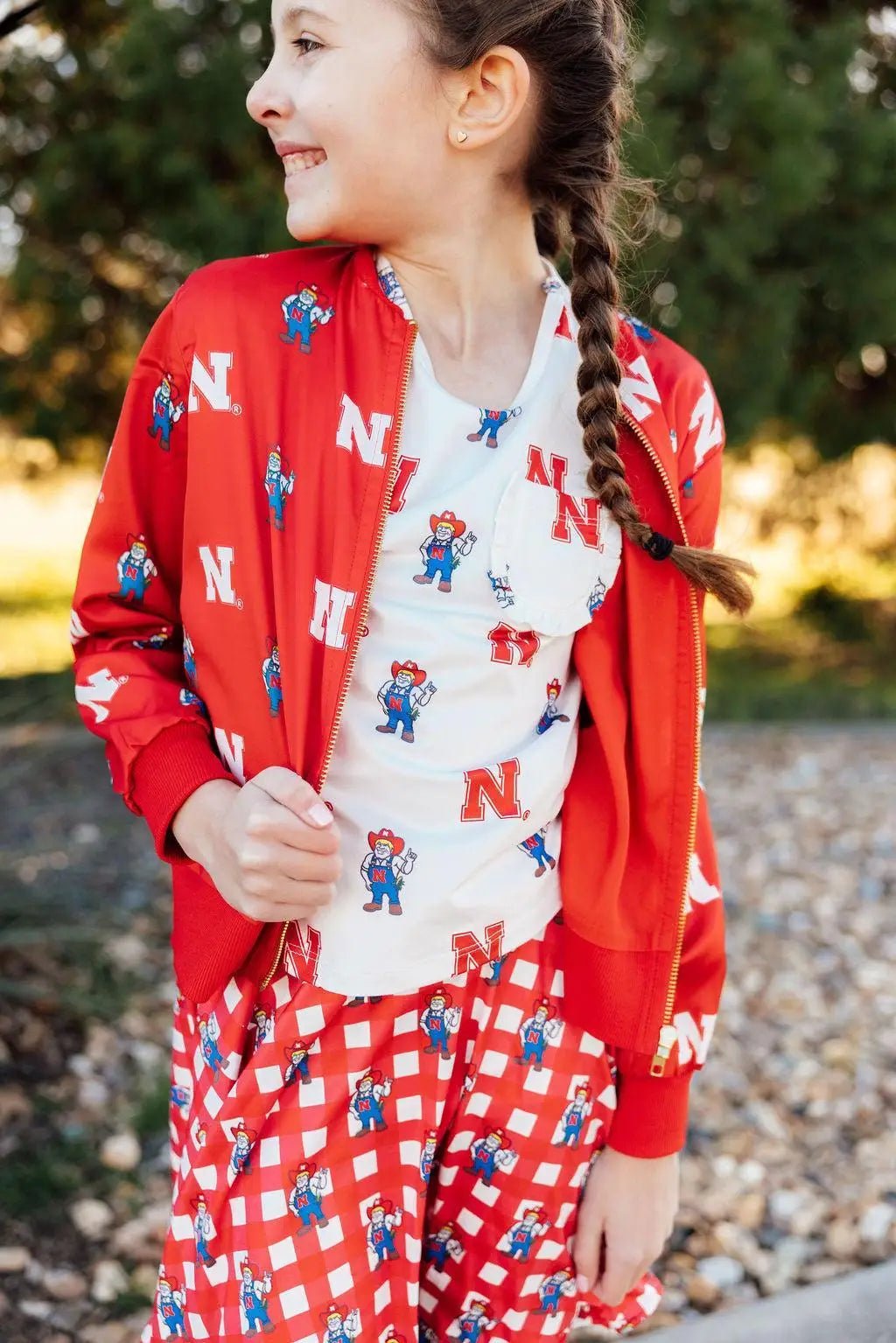 Mila & Rose ® Nebraska White Herbie Husker Ruffle Pocket Tee - 