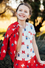 Mila & Rose ® Nebraska White Herbie Husker Ruffle Pocket Tee - 