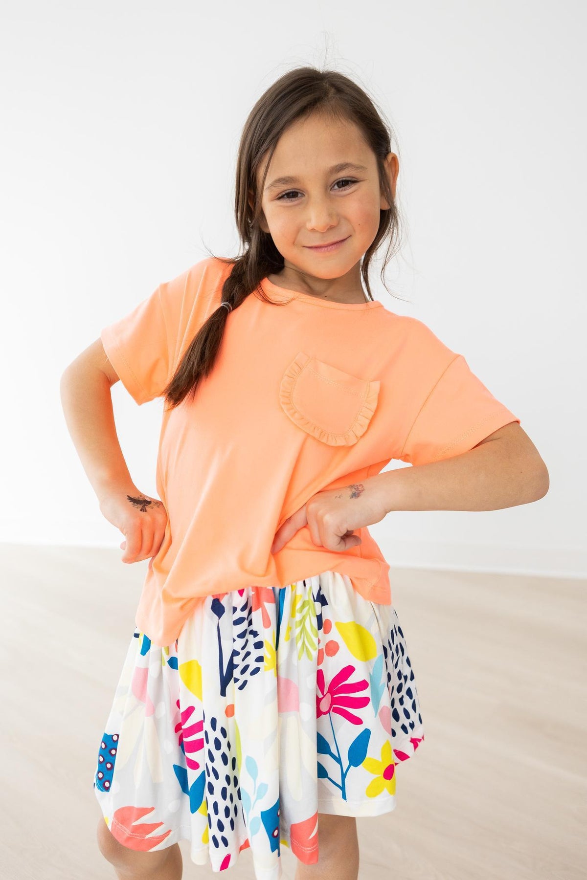 Mila & Rose ® Ruffle Pocket Tee: Trendy and versatile top for casual wear -