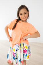 Mila & Rose ® Ruffle Pocket Tee: Trendy and versatile top for casual wear -