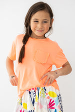 Mila & Rose ® Ruffle Pocket Tee: Trendy and versatile top for casual wear -