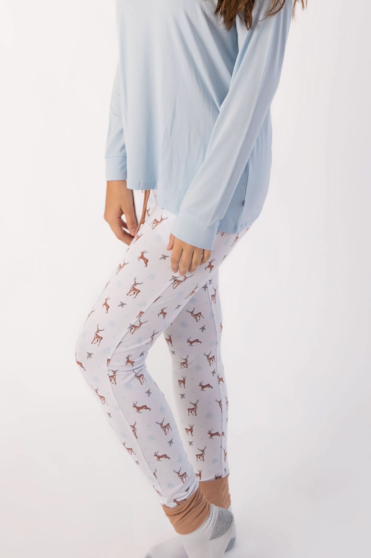 Tall adult joggers in a reindeer holiday print with side pockets and elastic cuffs