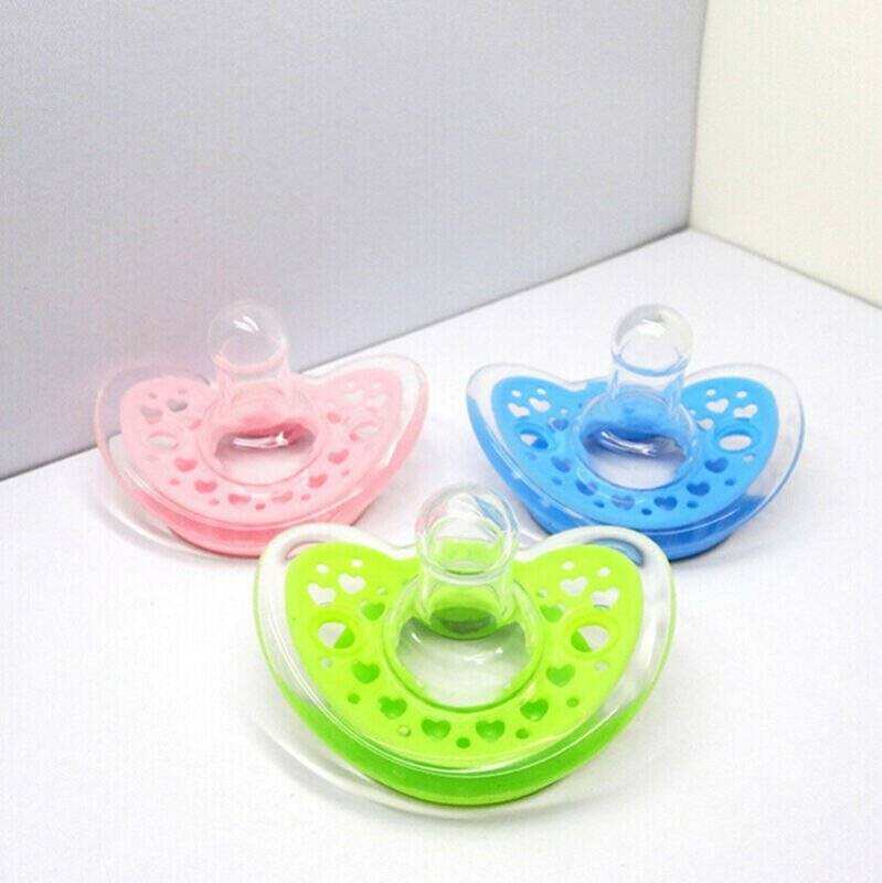 Newborn Infant BabyThis product's material is made of silica gel and is free of latex. It features a small circular hole and has a nipple mouth of standard size.Everetts Place: Online Boutique 