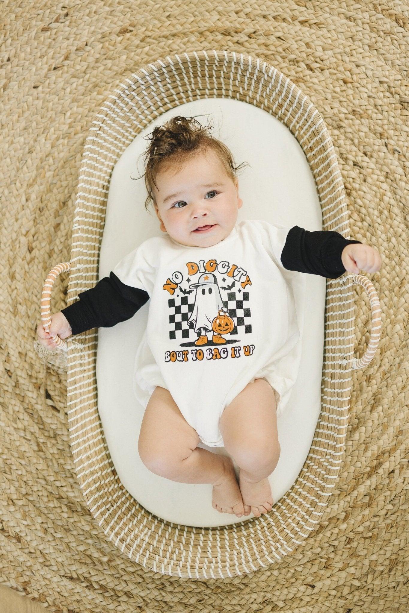 Colorblock sweatshirt romper with white body, black sleeves, and "No Diggity Bout to Bag It Up" Halloween graphic.