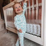 Norani Baby organic newborn footie with contrast zipper.