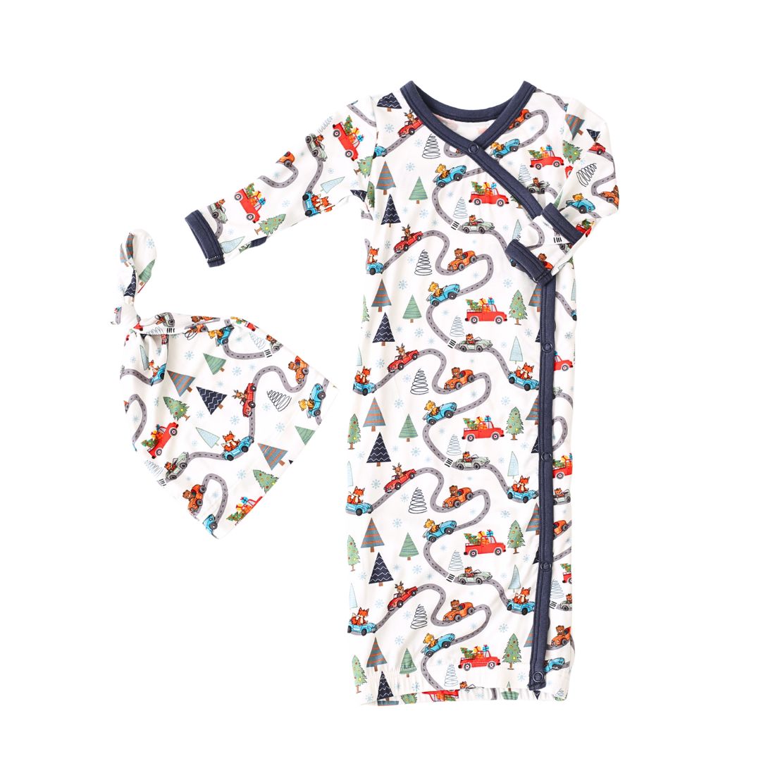 Baby gown and matching hat in a Holiday Haul print with fold-over mitten cuffs and enclosed foot opening