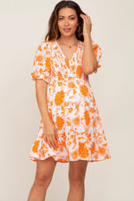 Orange Floral Smocked Puff Sleeve Maternity Dress - Orange, Day Dress, Person, Dress, Necklace | Everetts Place