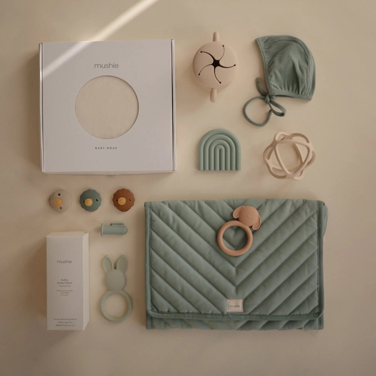 Mushie Organic Cotton Baby Wrap for Bonding and Comfort with Built - In Pocket - Everetts Place Boutique - 