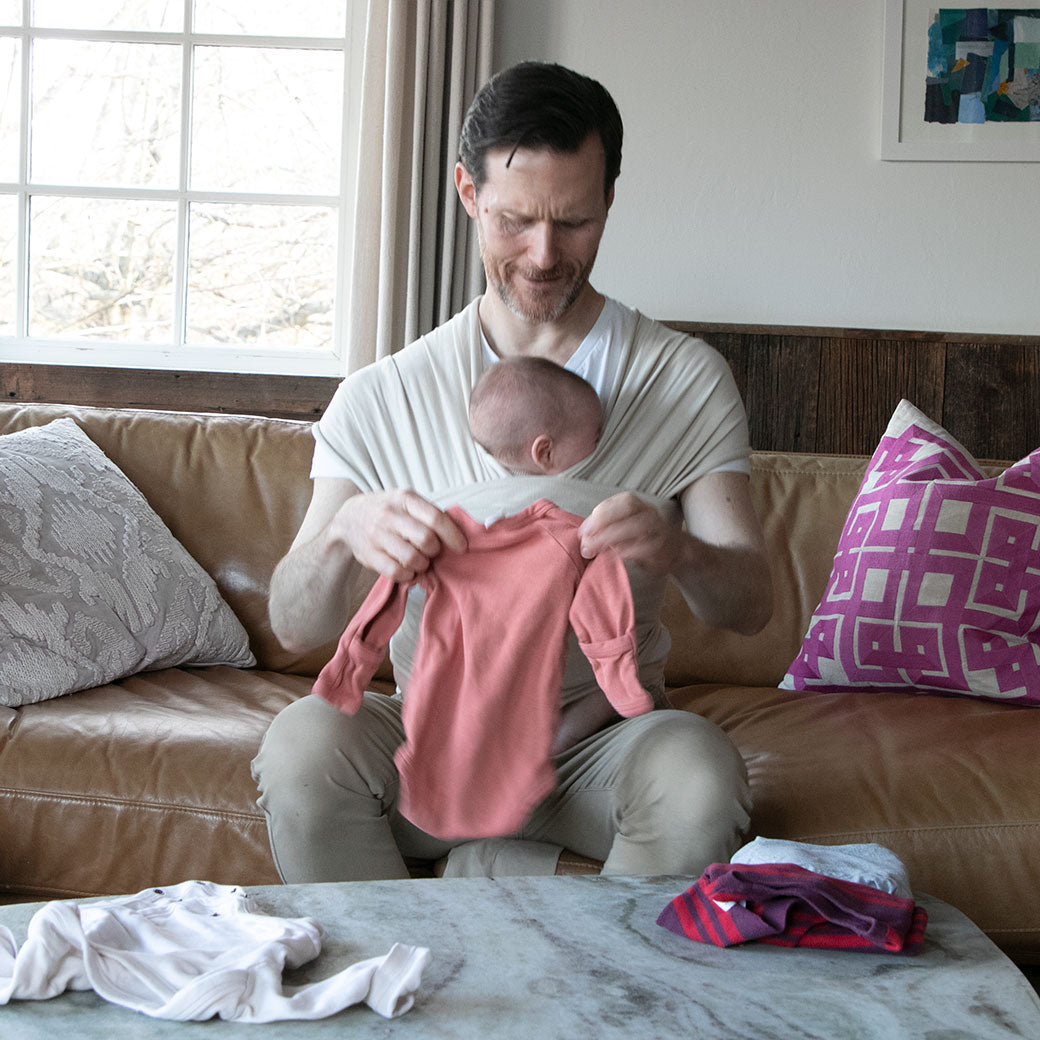 Modern Nursery organic cotton baby wrap, soft and breathable for infants.