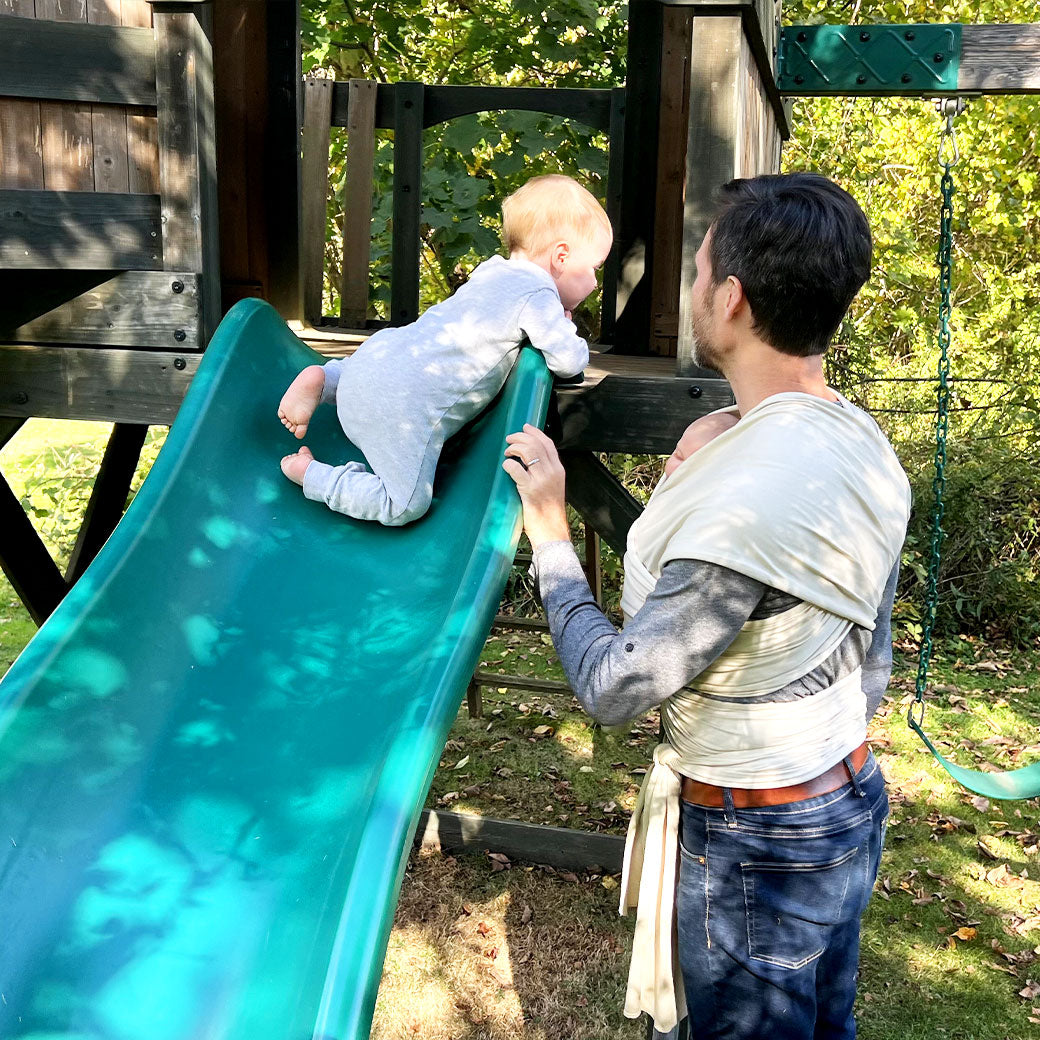 Modern Nursery™ organic cotton baby wrap, soft and breathable.