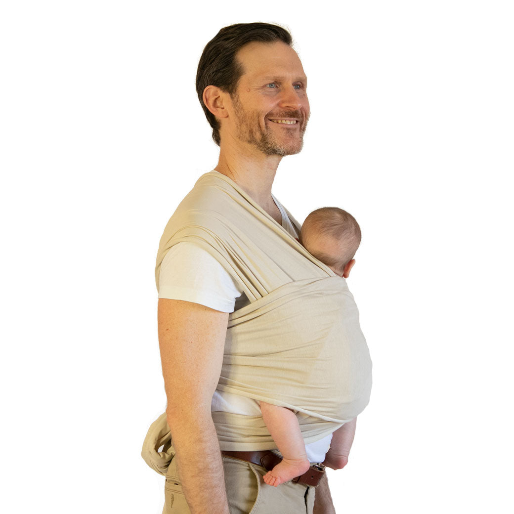Modern Nursery organic cotton baby wrap, soft, breathable, for gentle infant carrying.
