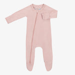 Pale mauve baby footie pajamas with long sleeves, full-length zipper, and covered feet
