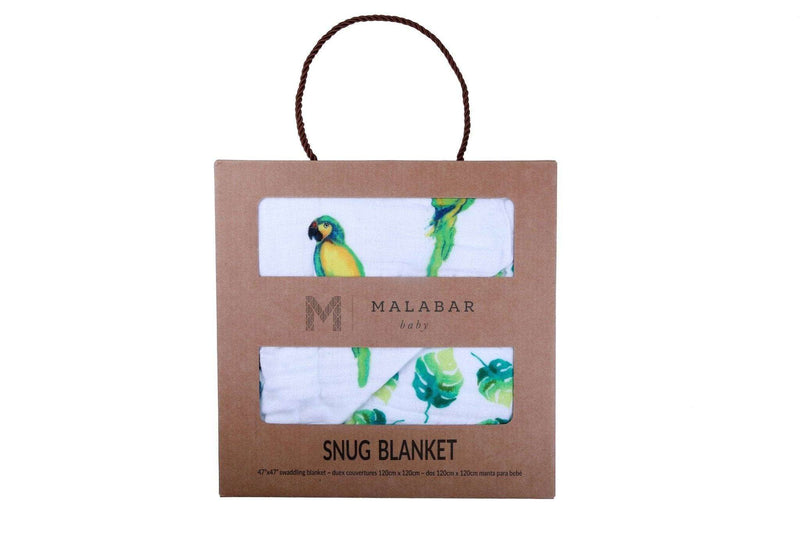 Parrots Organic Blanket in eco-friendly packaging with watercolor prints, made from 100% organic cotton.