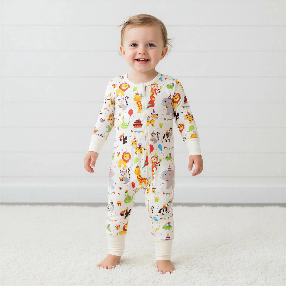 Baby convertible coverall with animal print, long sleeves, two-way zipper and convertible feet