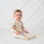 Baby footie pajamas in a party animals print with two-way front zipper and covered feet