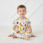 Two-piece pajama set with short sleeve top and long pants in a party animals print