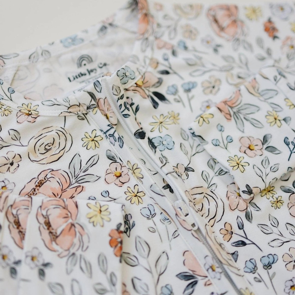 Little Joy Co. Pastel Petals Modal Zippy Romper For Baby With Feet - Everetts Place Boutique - 