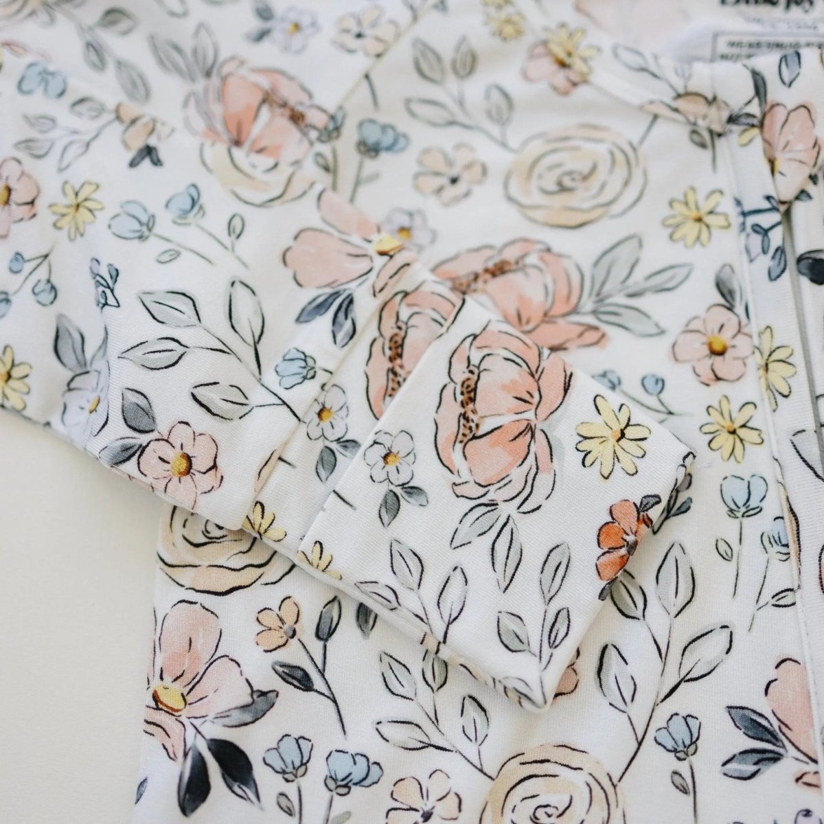 Little Joy Co. Pastel Petals Modal Zippy Romper For Baby With Feet - Everetts Place Boutique - 