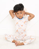 Two-piece short sleeve pajama set with Pasture Pals farm animal print top and matching long pants