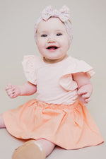 Mila & Rose ® Peach S/S Flutter BodysuitEveretts Place