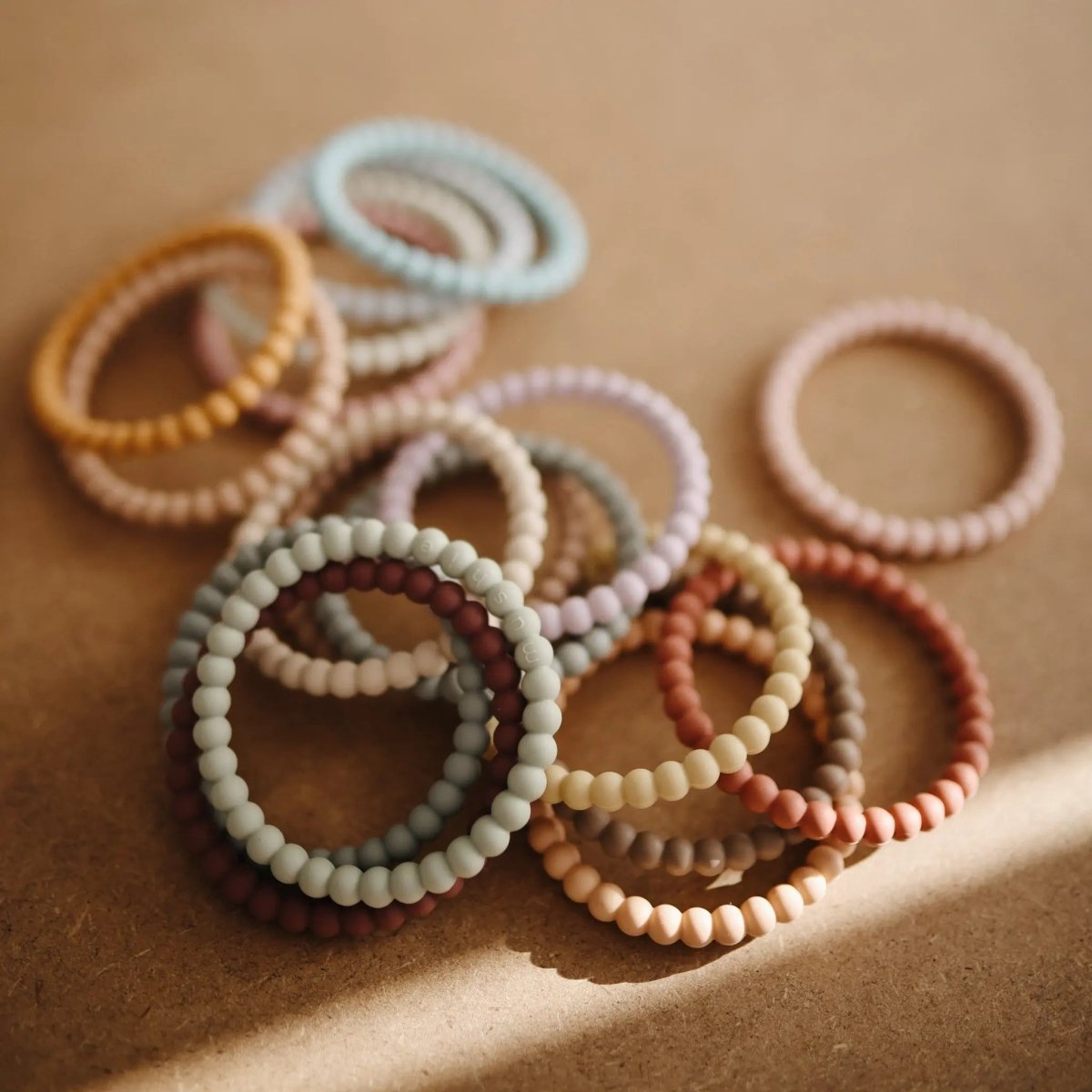 Mushie Pearl Teether Bracelet for Babies Non-Toxic Food-Grade Silicone Easy Grip Soothing Accessory -