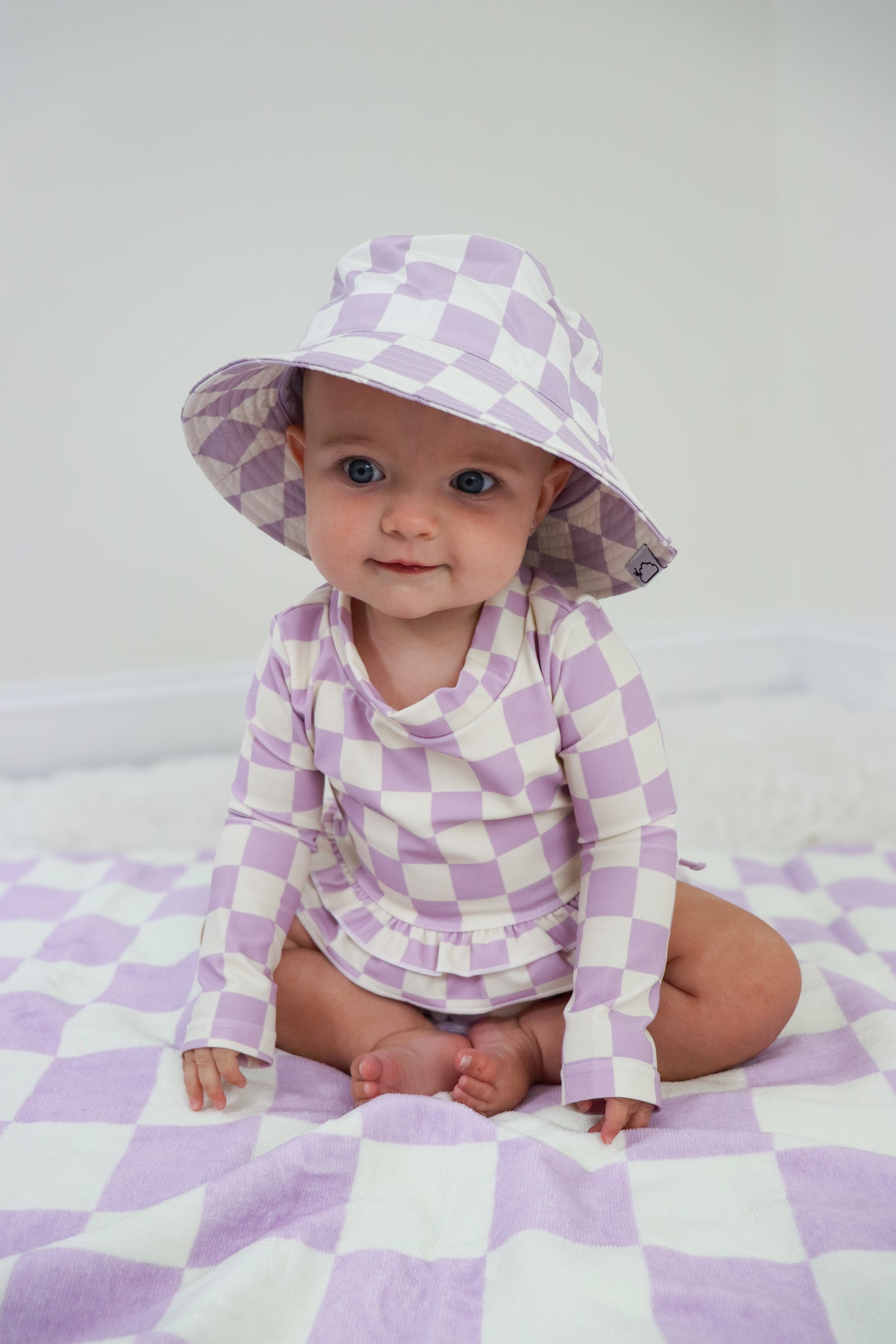 DREAM BIG LITTLE CO PERIWINKLE CHECKERS DREAM RASH GUARD RUFFLE TWO - PIECE SWIM SUITEveretts Place