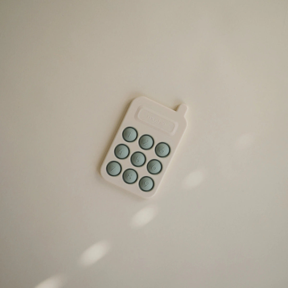 Mushie Phone Press Toy - 