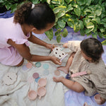 Mushie organic cotton muslin swaddle blanket