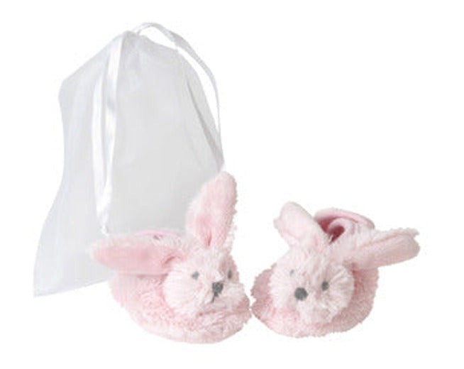 Pink rabbit baby slippers with bunny design, shown with an organza gift bag