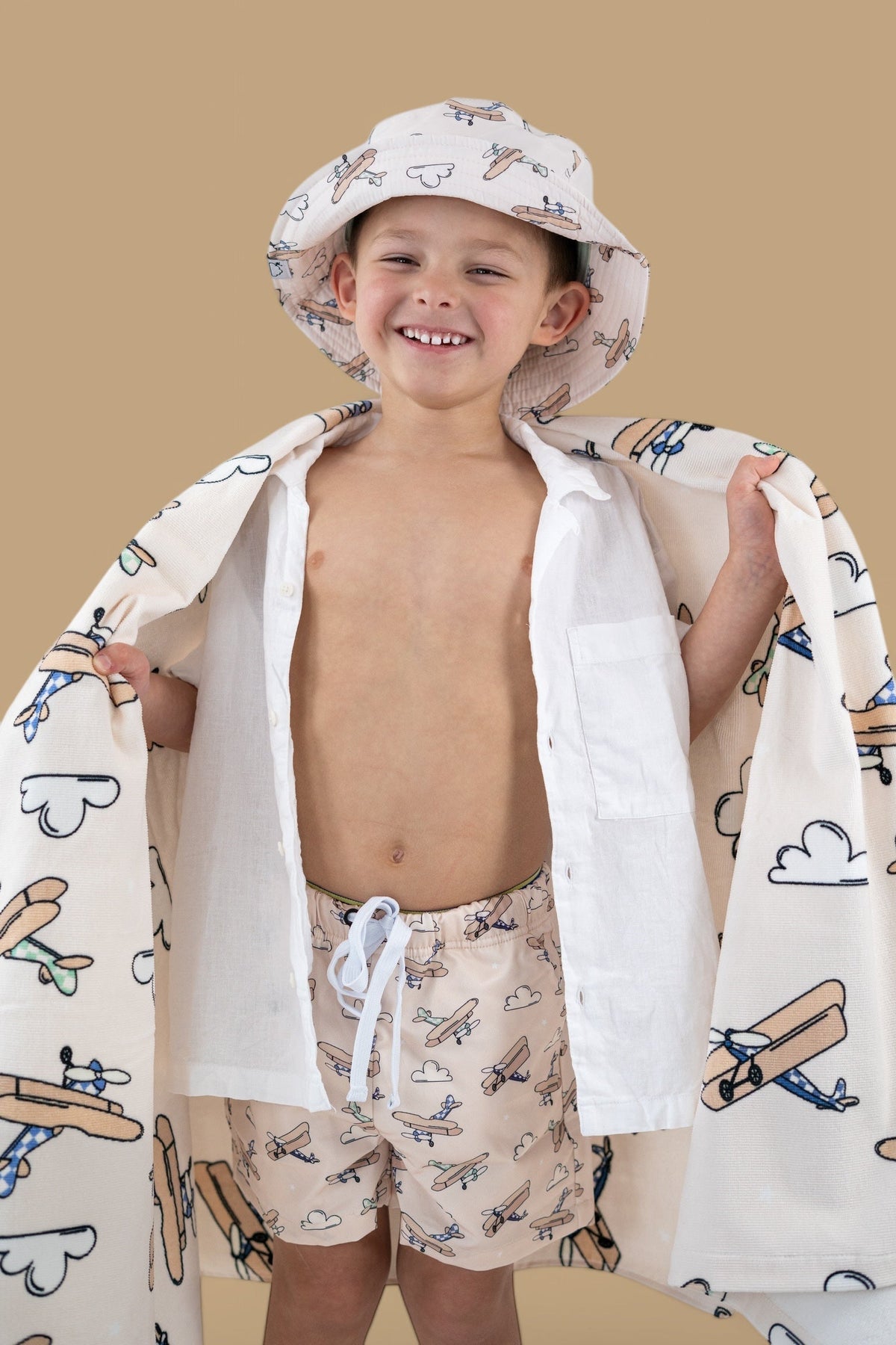 DREAM BIG LITTLE CO Plane Fun Dream Towel With Vintage Biplane Print In Soft HuesEveretts Place
