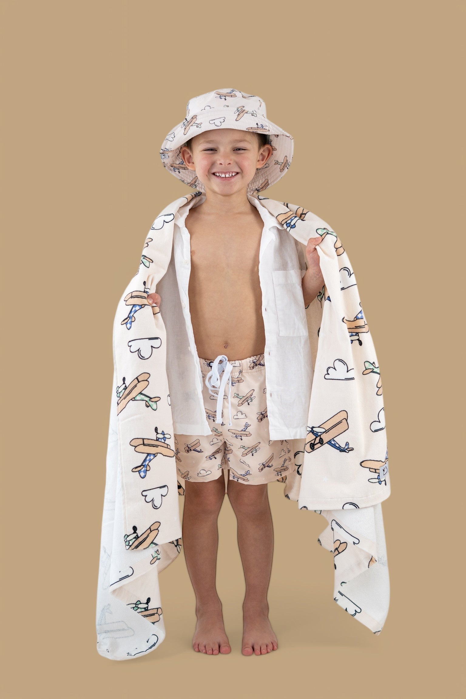 DREAM BIG LITTLE CO Plane Fun Dream Towel With Vintage Biplane Print In Soft HuesEveretts Place