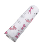 Soft bamboo muslin swaddle with a playful kitty pattern, perfect for baby's comfort and sleep.