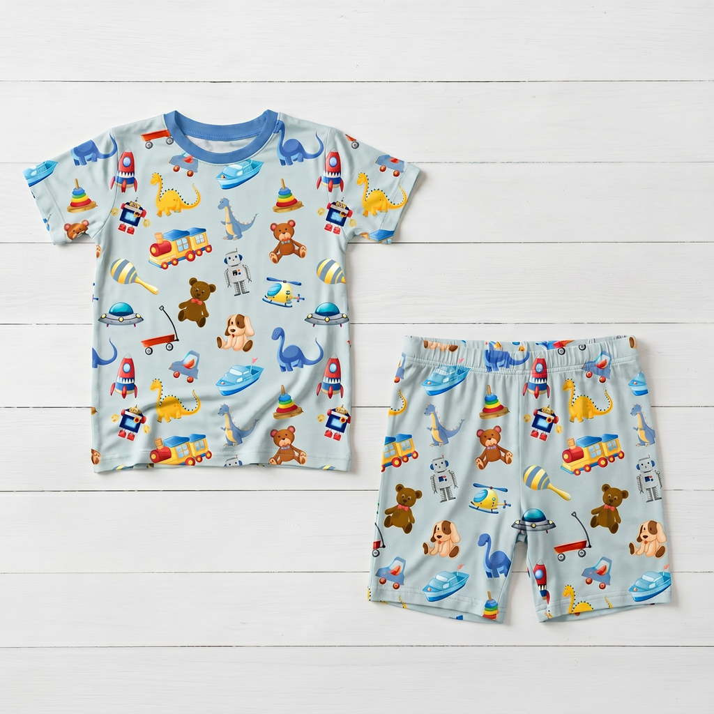 Two-piece pajama set with short sleeve top and matching shorts in a playtime buddies print