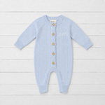 Powder blue pointelle knit baby romper with front buttons, long sleeves and ribbed cuffs