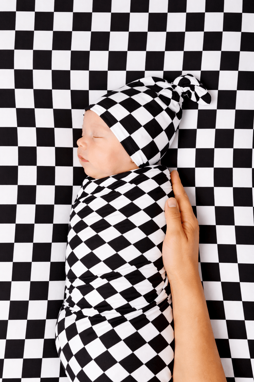 Little Mae & Co Race Black & White Checkered Stretch SwaddleEveretts Place