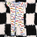 Baby coverall with a whimsical racing cars print, long sleeves, fold-over feet, and a full-length front zipper