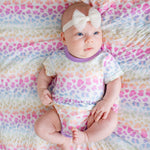 Bodysuit dress in pink with short sleeves and snap closure at the inseam
