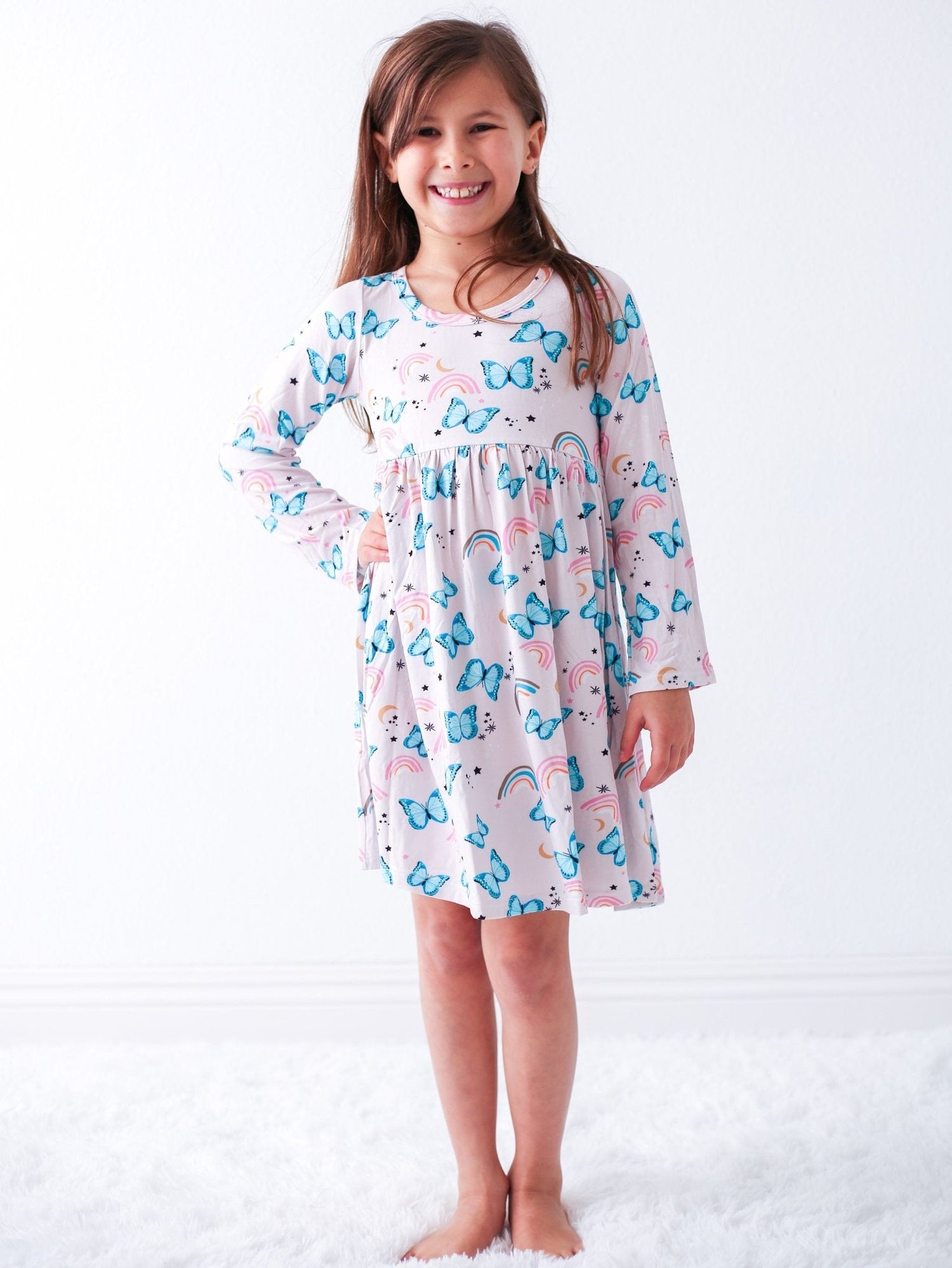 Toddler dress with long sleeves in a retro butterfly print