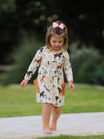 Long sleeve dress with an all-over western horse print