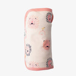 Pink swaddle blanket with a playful animal roar print, laid out flat.
