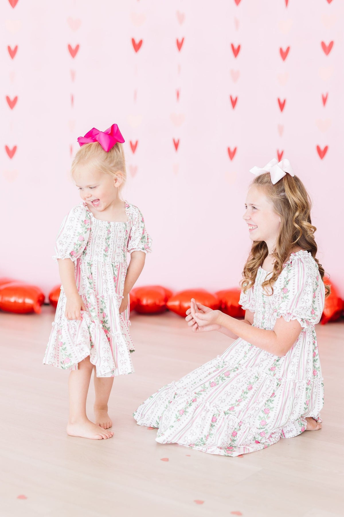 Mila & Rose ® Rosebud Bows Smocked Ruffle DressEveretts Place