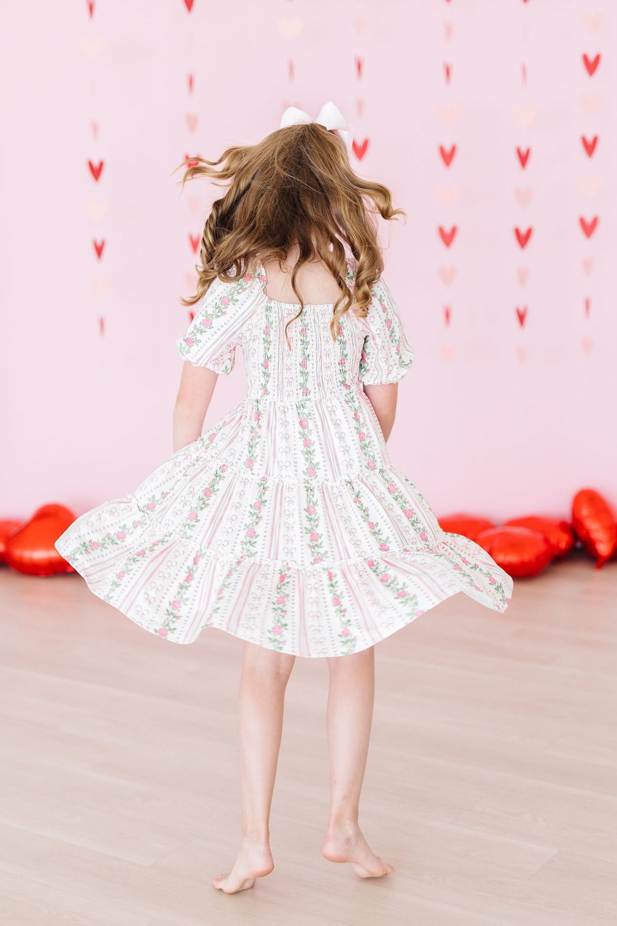 Mila & Rose ® Rosebud Bows Smocked Ruffle DressEveretts Place