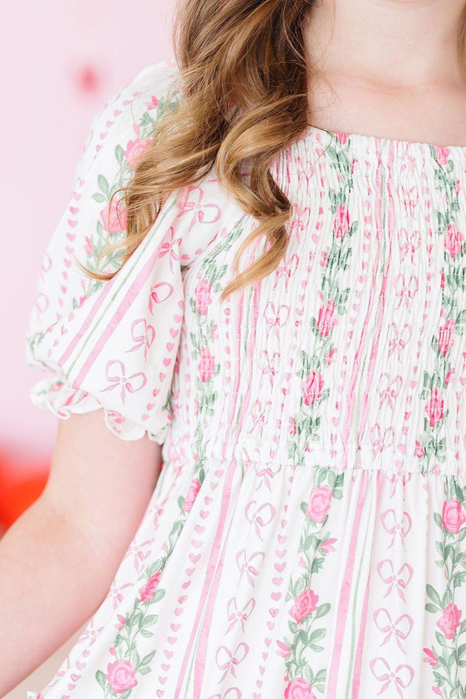 Mila & Rose ® Rosebud Bows Smocked Ruffle DressEveretts Place